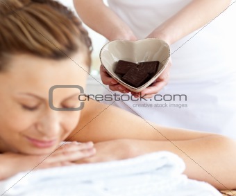 Relaxed woman lying on a massage table