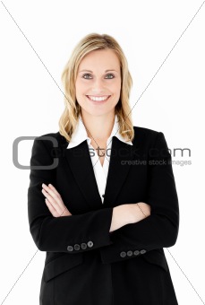 Smiling businesswoman with folded arms looking at the camera 