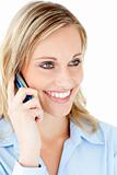 Delighted businesswoman talking on phone 