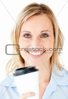 Portrait of a beautiful businesswoman holding a coffee 