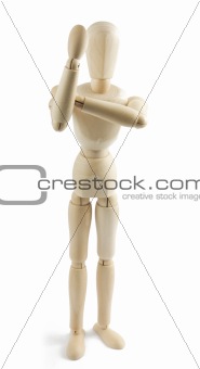 Wooden mannequin shows indecent gesture