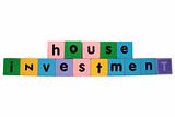 house investment in toy block letters