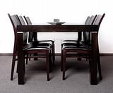 Modern wooden finished dining table