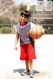 Adorable boy with basketball 