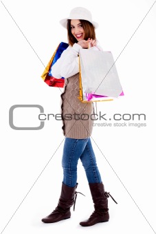 lady posing with shopping bags