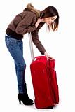 young woman searching her baggage