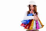 Young lady happy with lot of shopping bags