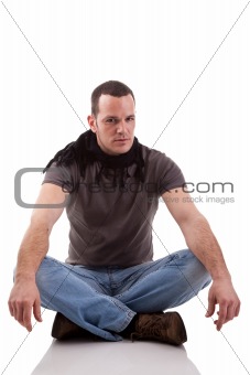 handsome man, sitting on the floor