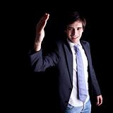 young businessman waving