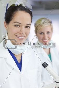 Attractive Scientists or Woman Doctors In Laboratory