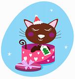 Brown christmas cat in pink gift box