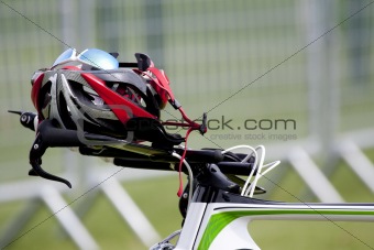 Helmet on the handlebars of a bike