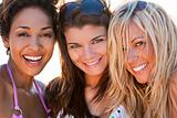 Three Beautiful Young Women Friends Laughing At The Beach