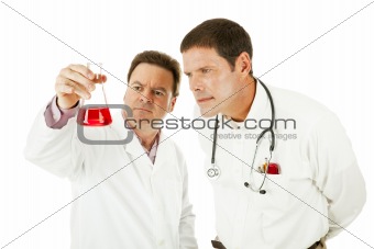 Doctor Working With Scientist