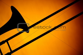 Trombone Silhouette Isolated On Gold