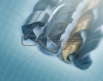 drill bit on an abstract background with soft focus