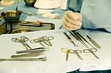 surgical tools and nurse hand