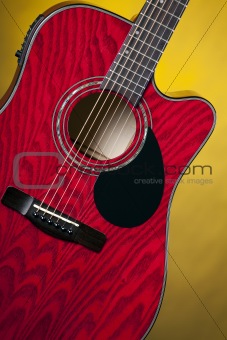 Red Acoustic Guitar on Yellow