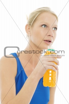 woman wearing a sports blue vest and drinks a bottle of energy drinks
