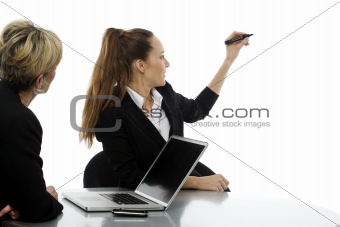 Young businesswoman with trolley on white background studio