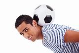 handsome latin boy holding a soccer ball, isolated on white, studio shot
