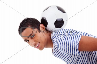 handsome latin boy holding a soccer ball, isolated on white, studio shot