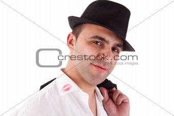 seductive man with his hat, the shirt with lipstick mark