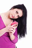 beautiful young woman on the phone, looking at the camera