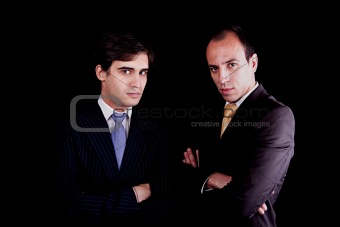 two young businessmen with a serious look