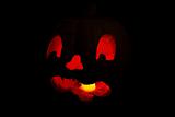 Red glow of a jack o'lantern face