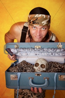 Man with skull in suitcase
