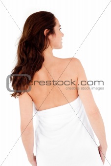 Beautiful hispanic woman with a towel on her body