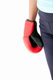 Close-up of the fist of a hispanic woman wearing boxing gloves