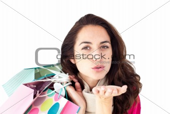 Hispanic woman holding shopping bags