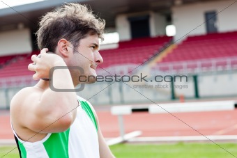 Determined male athlete preparing to throw weight