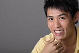 Smiling Asian young man