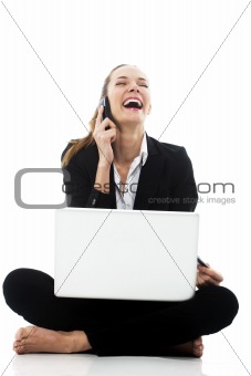 businesswoman with laptop on the floor on white background studio