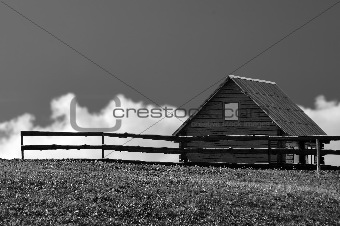 The wooden rural house, black and white