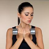 Girl with dumbbells