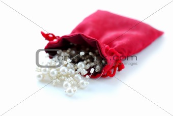 Pearls in red pouch