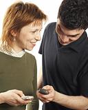 young couple using mobile phones