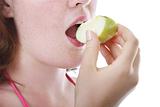Girl eating apple close up