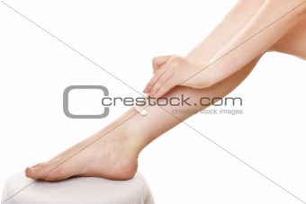 Lady shaving legs close up, 1