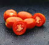 Five red tomatoes