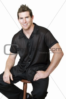 Caucasian male sitting