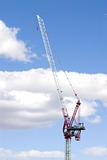 Construction Site Crane with Clouds on the Background