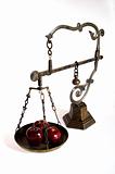 antique scale with apples