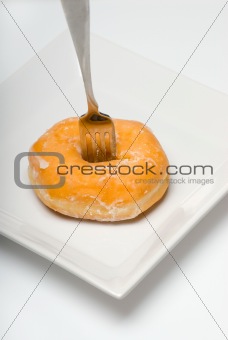 glazed donut with fork