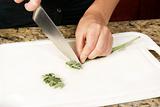 Cutting Sage in Kitchen