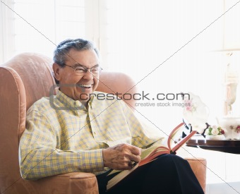 Mature man reading.